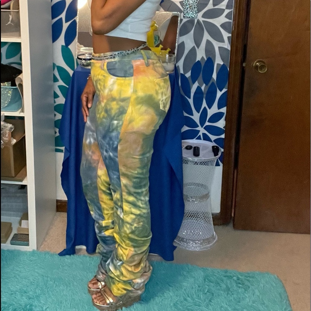 Daisy Tie dye Stacked leg Jeans. Pastel colors, size Large and Small.